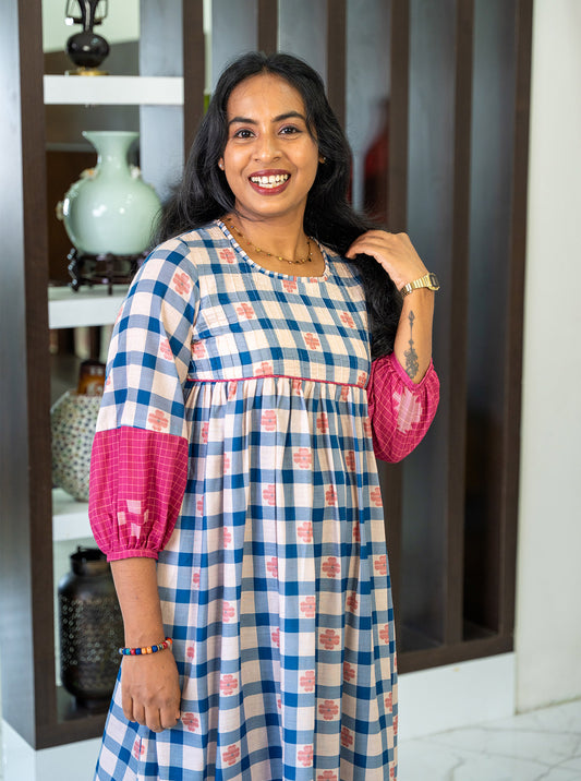 Close-up of blue and pink checks with flower motif cotton digital print fabric - Ariyaa