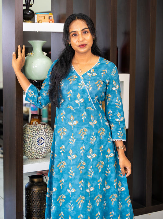 Blue leaf print cotton A-line kurti with overlap V neck, front view - Ariyaa