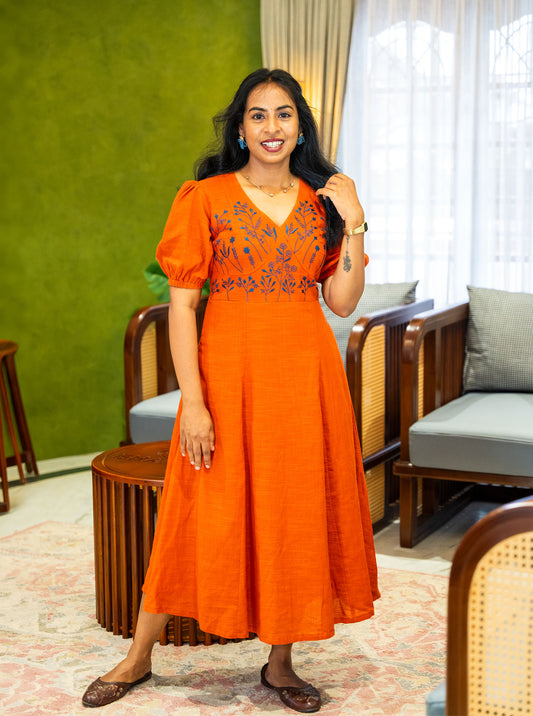 Orange embroidered slub cotton A-line dress with V neck, full length front - Ariyaa