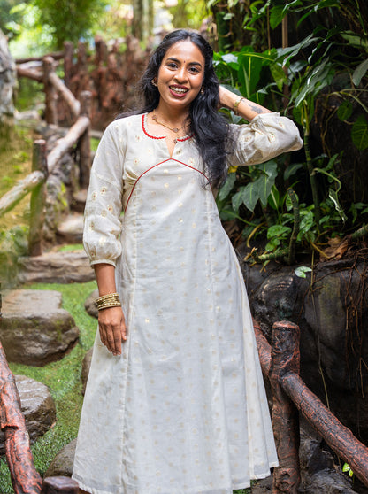 Flat lay of cream cotton Alia cut kurti with pockets - Ariyaa