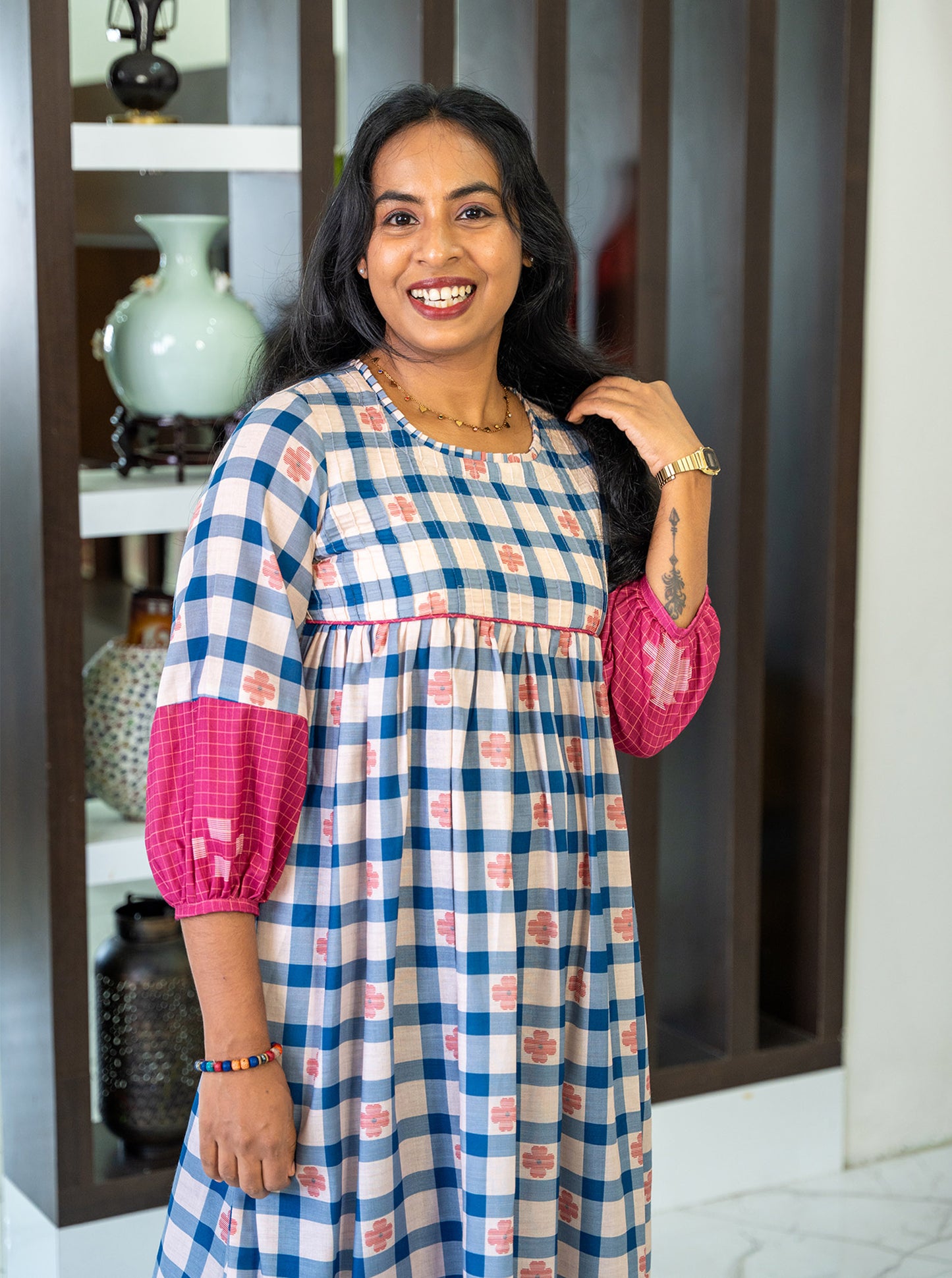 Close-up of blue and pink checks with flower motif cotton digital print fabric - Ariyaa