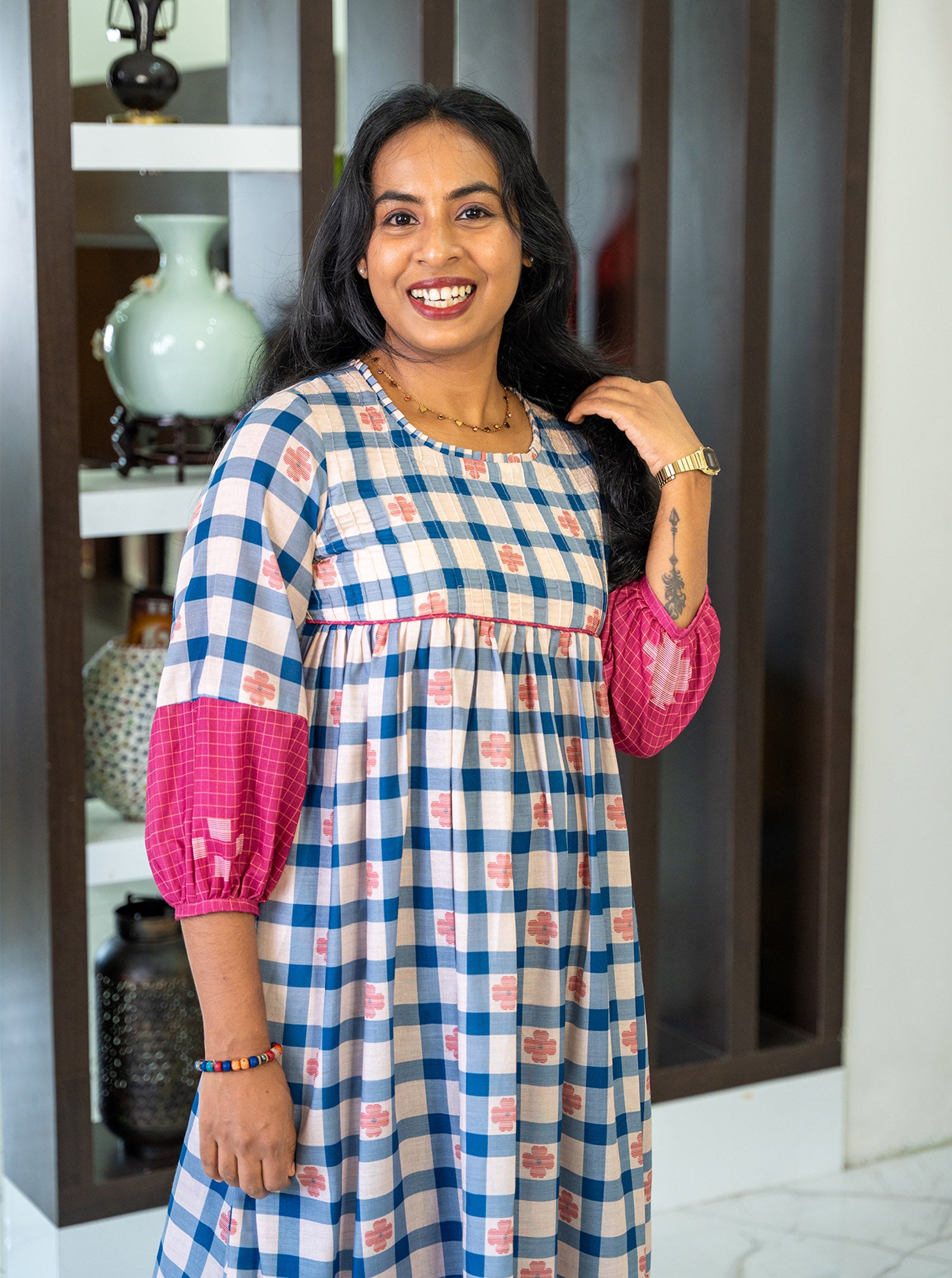 Close-up of blue and pink checks with flower motif cotton digital print fabric - Ariyaa