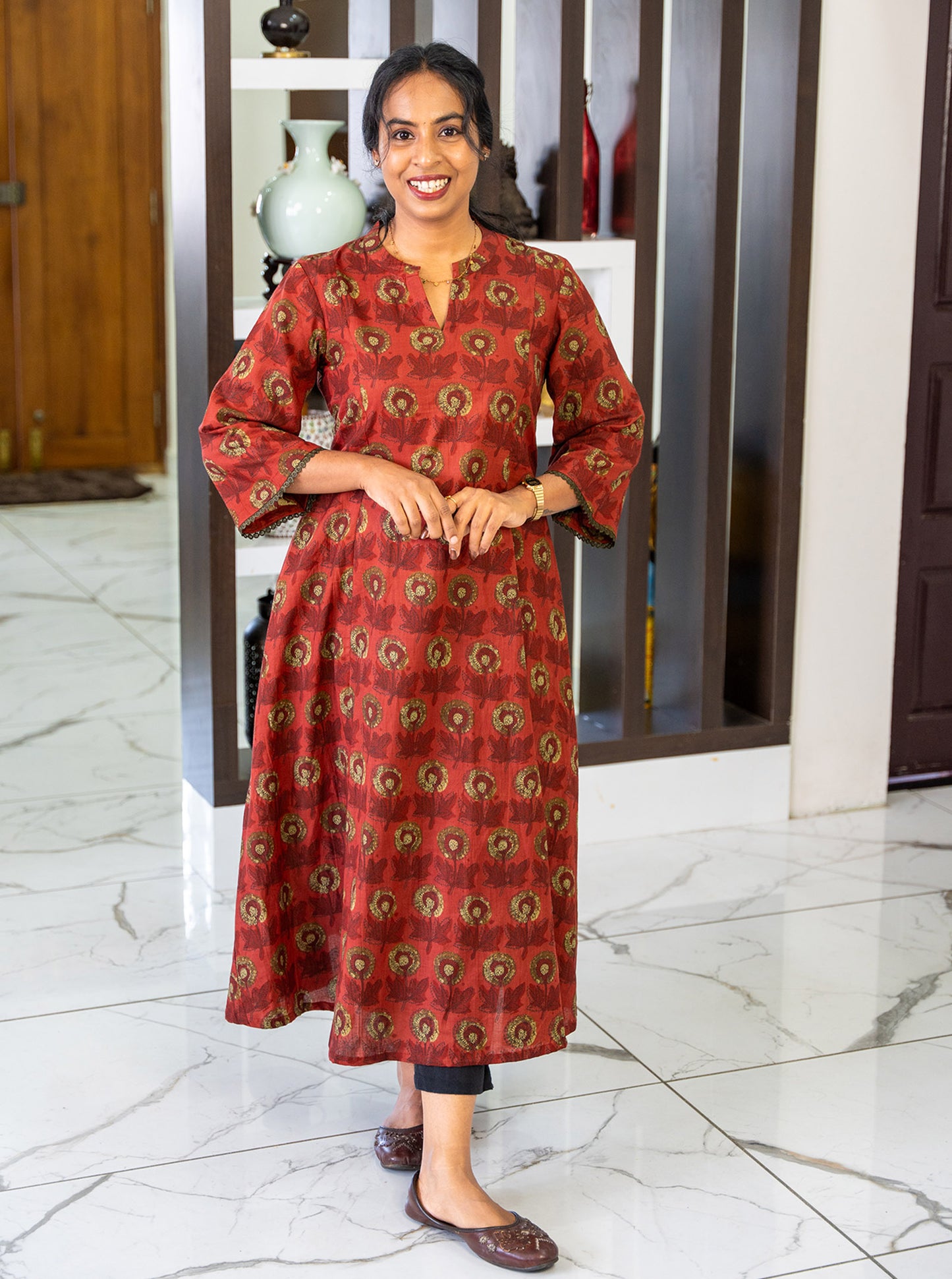 Full-length view of 46-inch A-line terracotta cotton kurti - Ariyaa