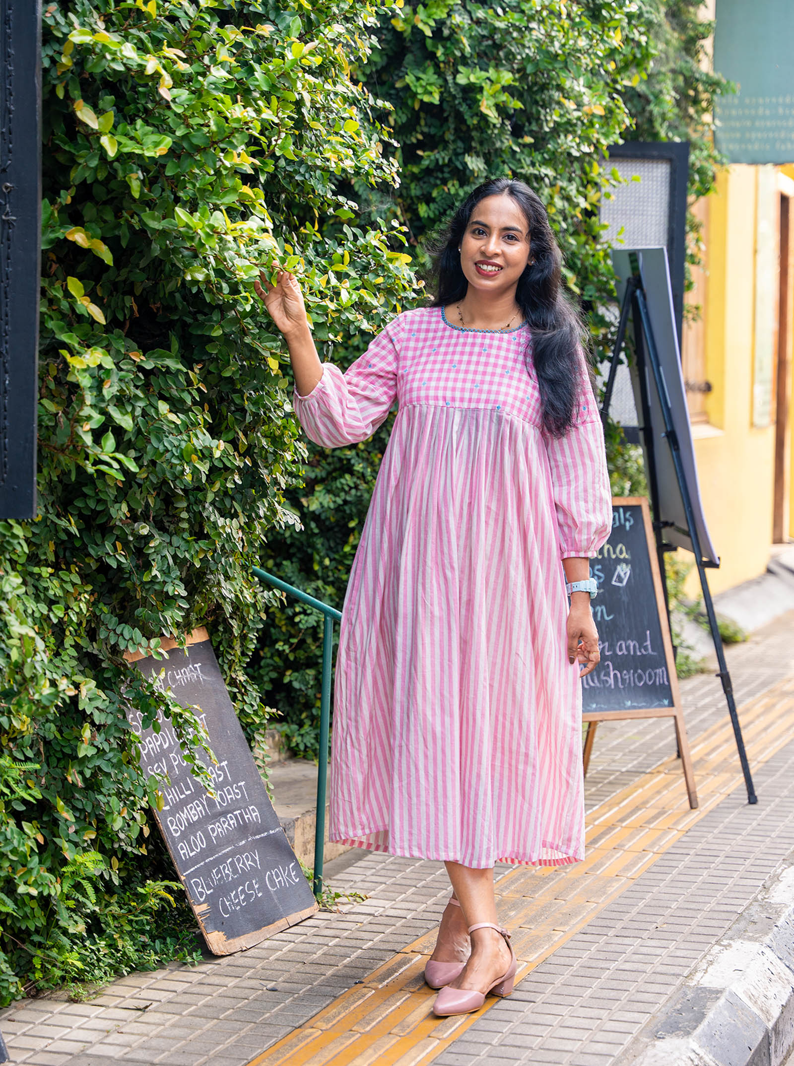 Full-length view of pink and white bell sleeve kurti, 47 inches - Ariyaa