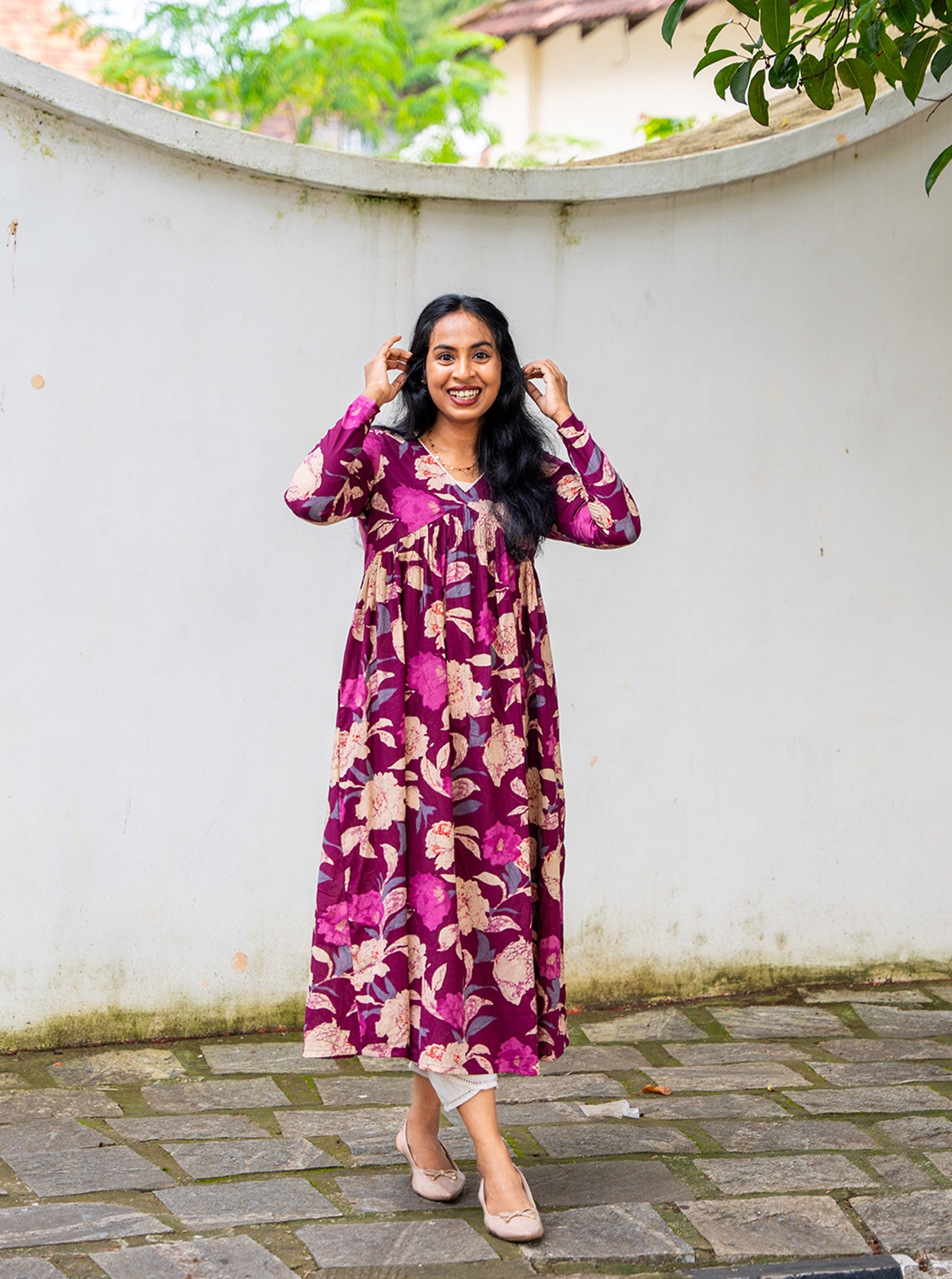 Close-up of purple cotton fabric and floral print texture - Ariyaa