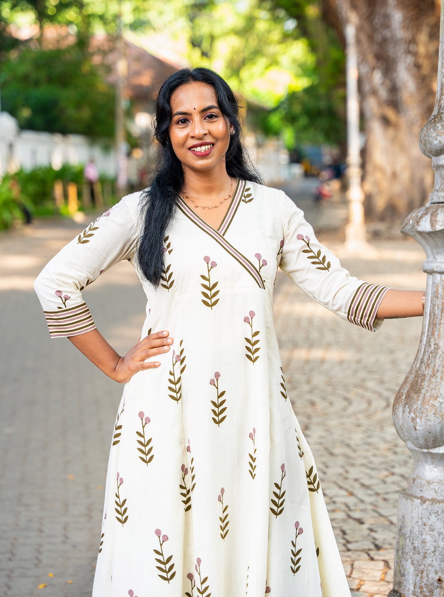 Close-up of flower motif pattern on cotton fabric — Ariyaa