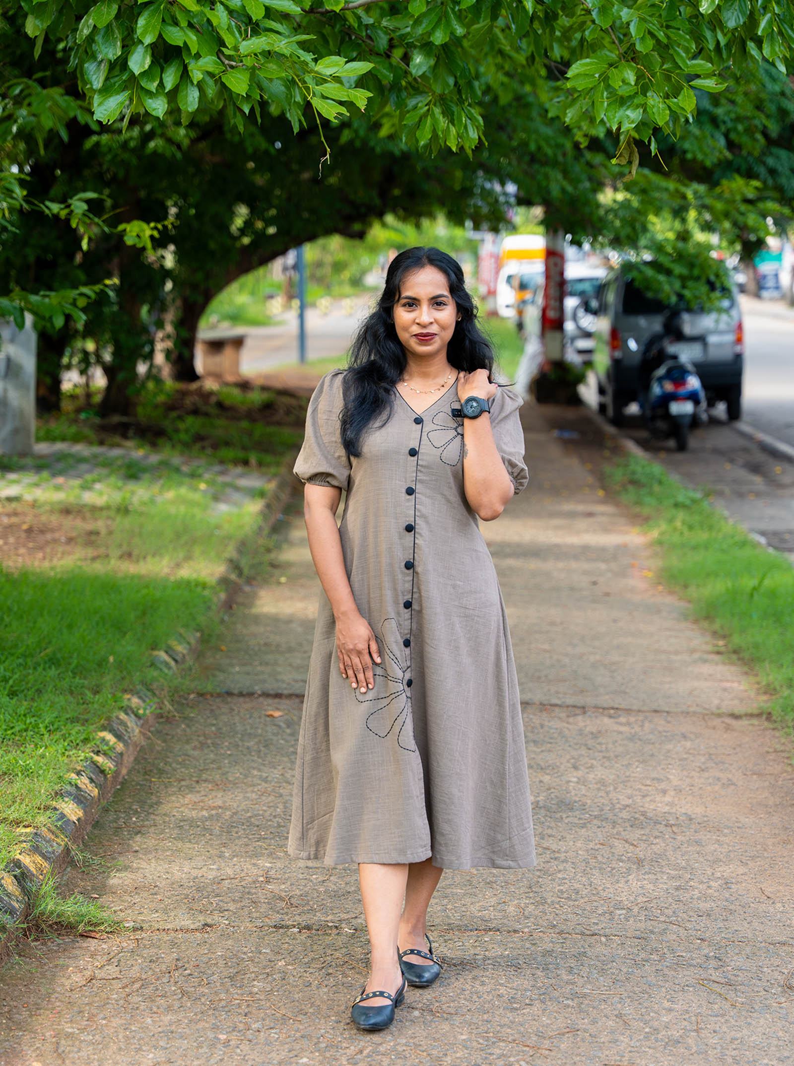 Model wearing grey floral embroidery slub cotton a-line kurti full length — Ariyaa