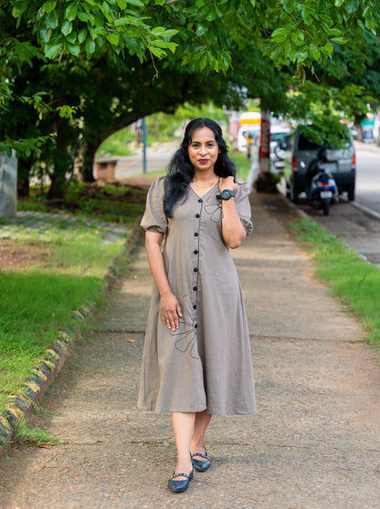 Model wearing grey floral embroidery slub cotton a-line kurti full length — Ariyaa