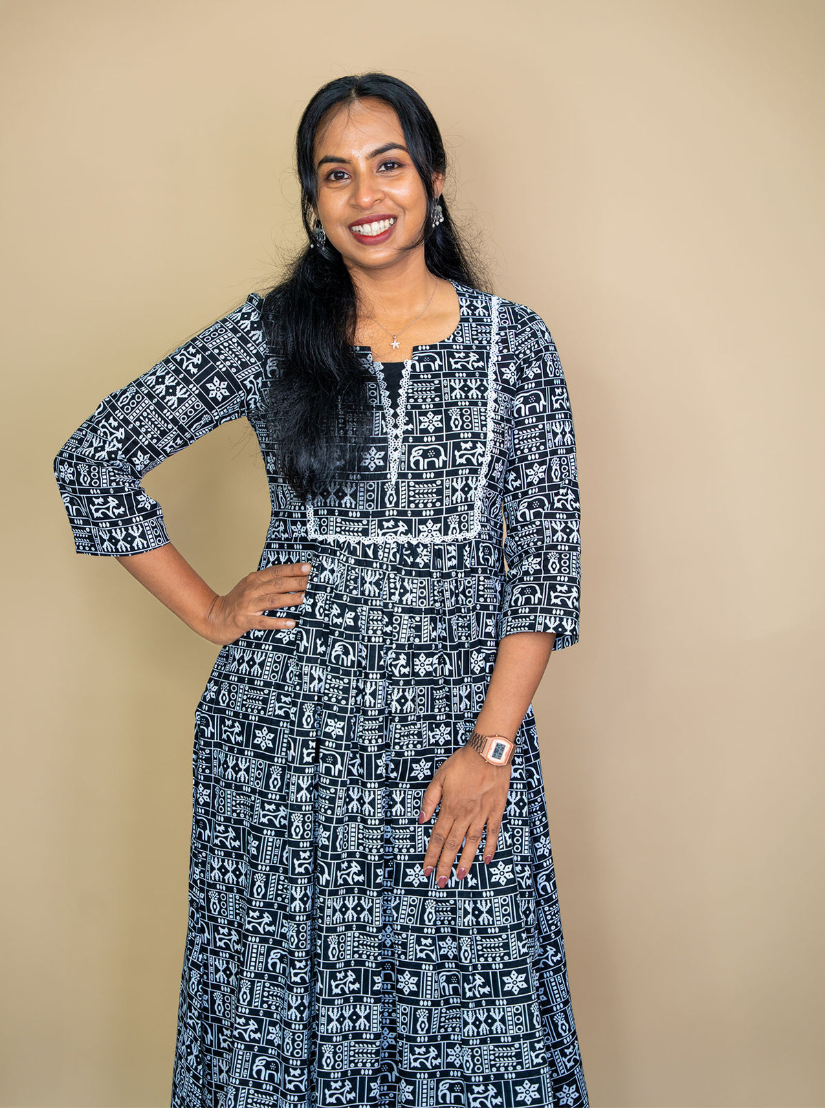 Black and white printed kurti showing U neck with V cut and 3/4th sleeves - Ariyaa