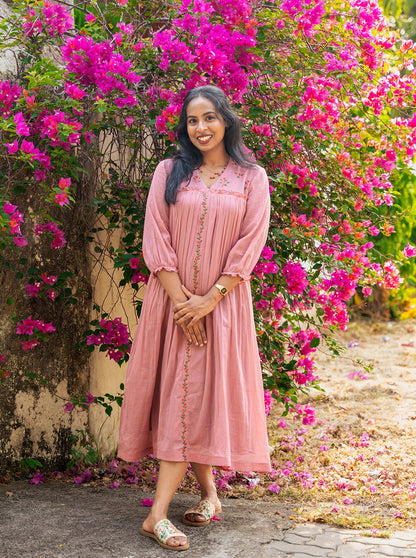 Model wearing pastel pink embroidered kurti full length — Ariyaa