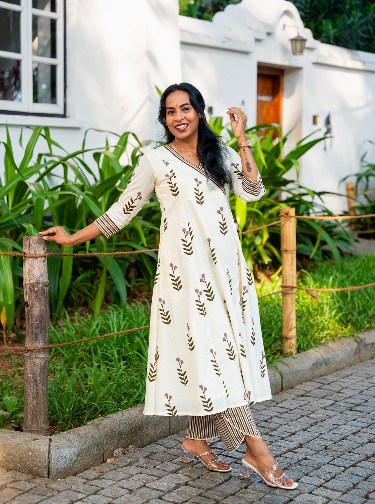 Model wearing cream flower motif cotton 3 panel aline co-ord set full length — Ariyaa