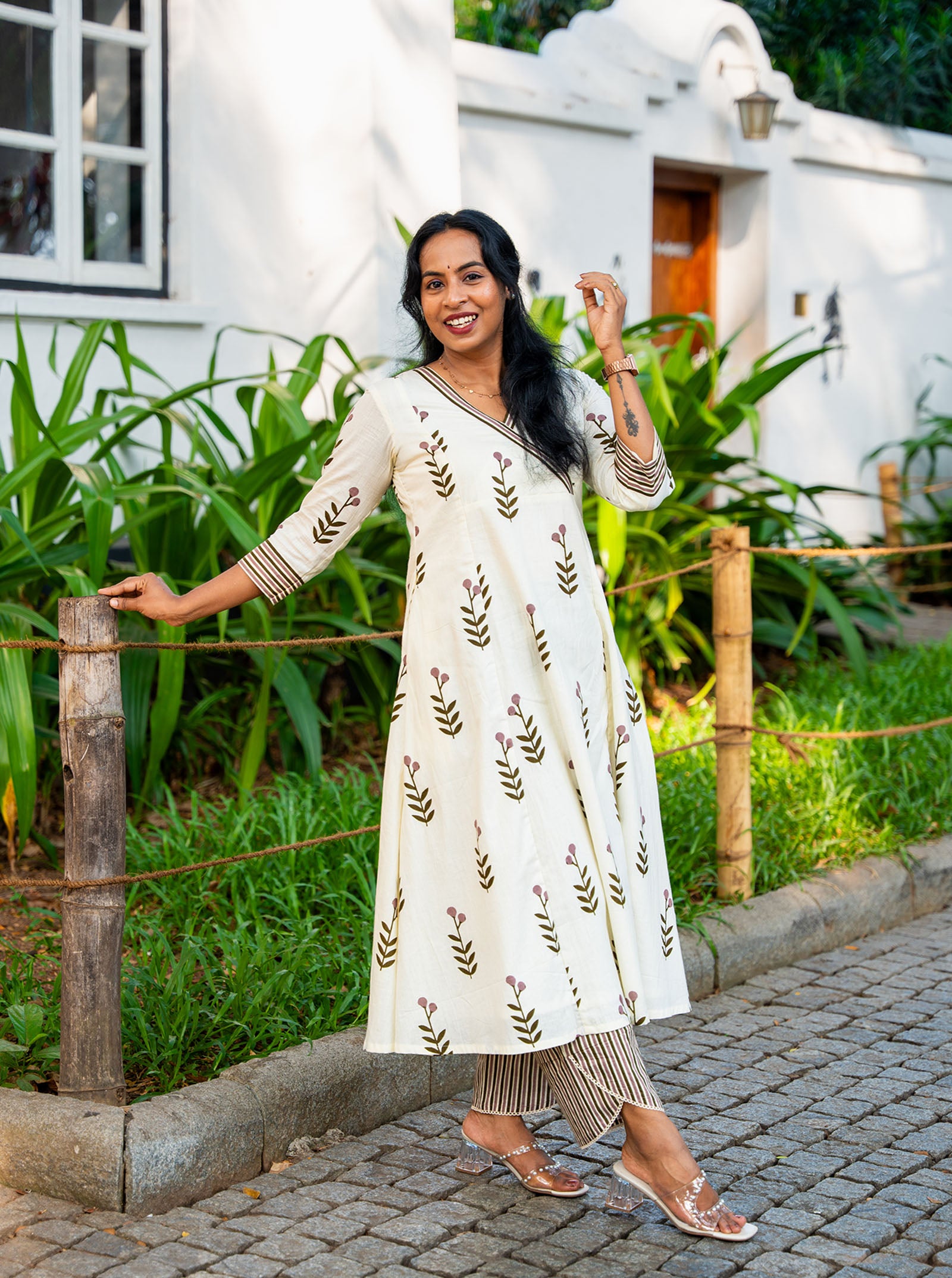 Model wearing cream flower motif cotton 3 panel aline co-ord set full length — Ariyaa