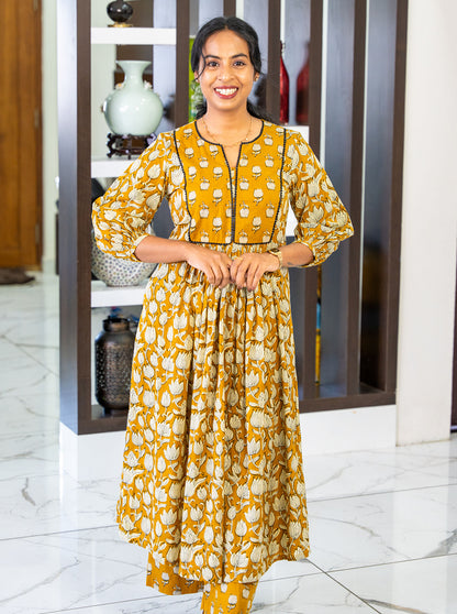 Styled look of tanned yellow floral cotton co-ord set for office and casual wear - Ariyaa