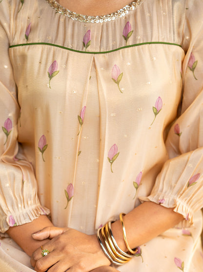 Detail shot of pintuck yoke with green piping and pearl lace round neckline - Ariyaa