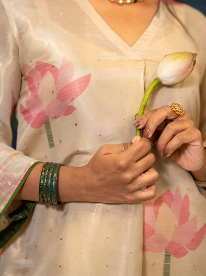 Close-up of digital printed pink lotus and golden butta on silk fabric - Ariyaa