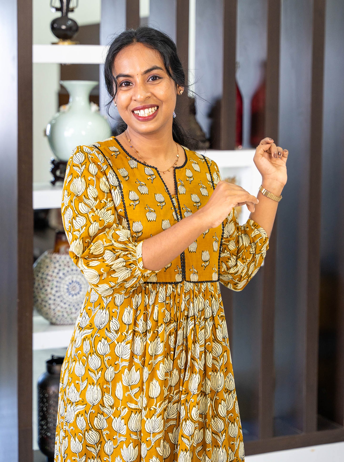 Side profile of tanned yellow co-ord set showing A-line silhouette - Ariyaa