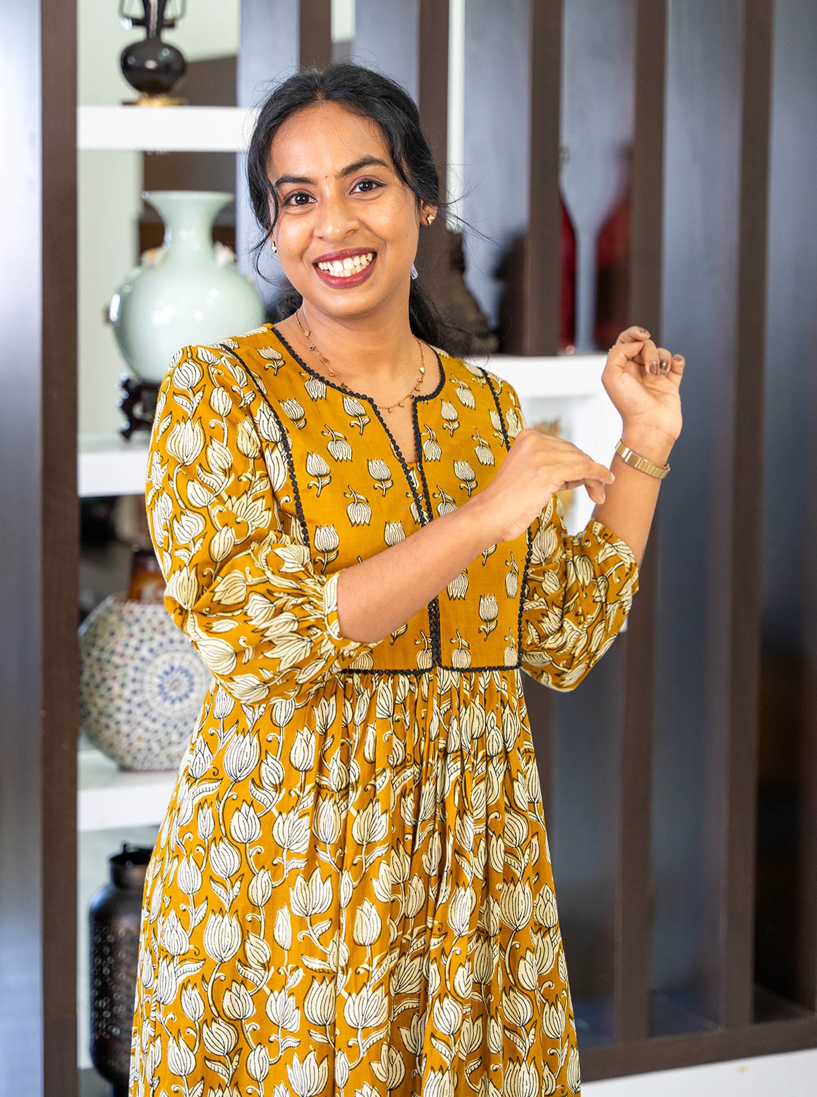 Side profile of tanned yellow co-ord set showing A-line silhouette - Ariyaa