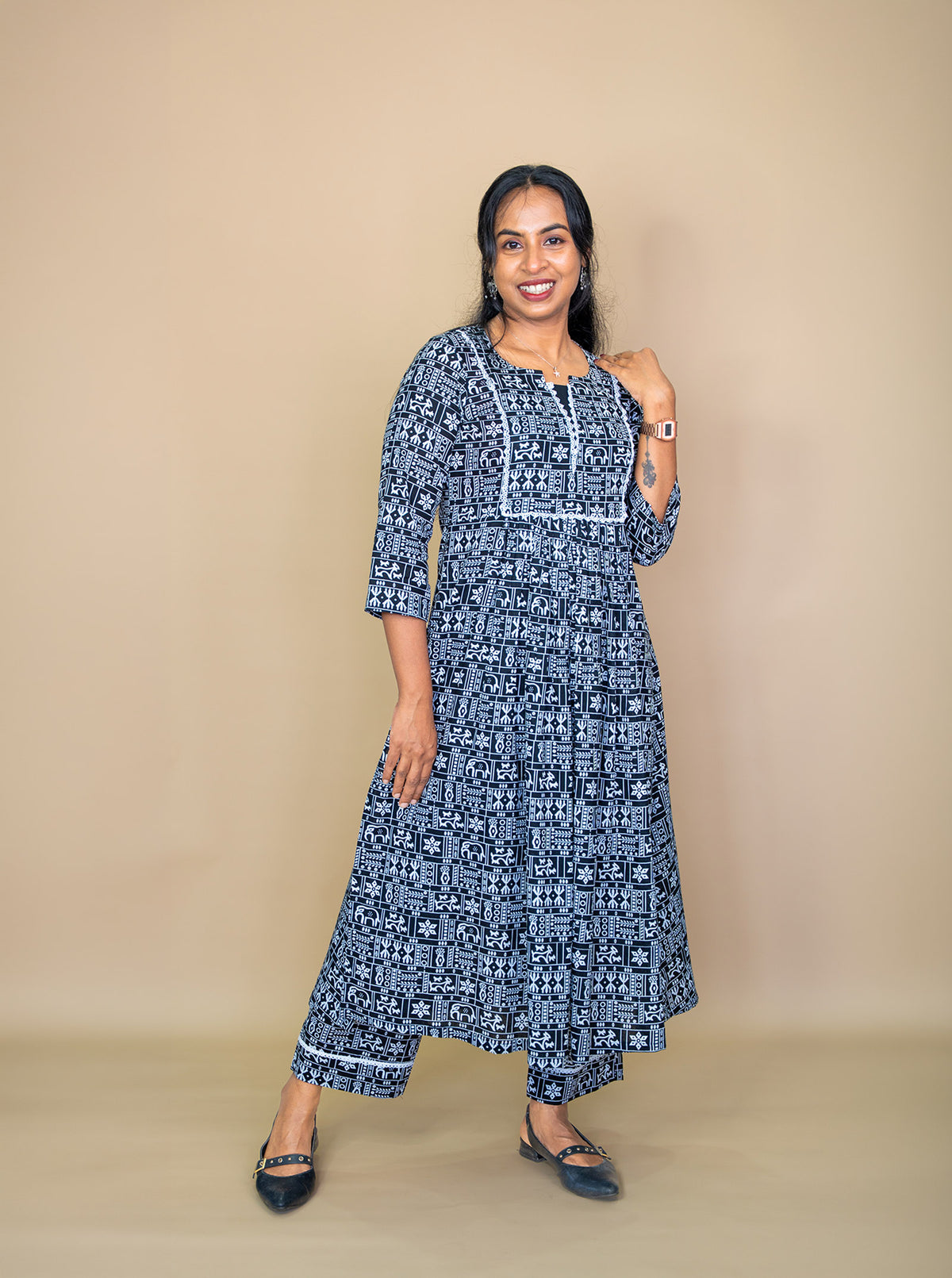 Side view of black and white cotton co-ord set showing flare and easy fit - Ariyaa