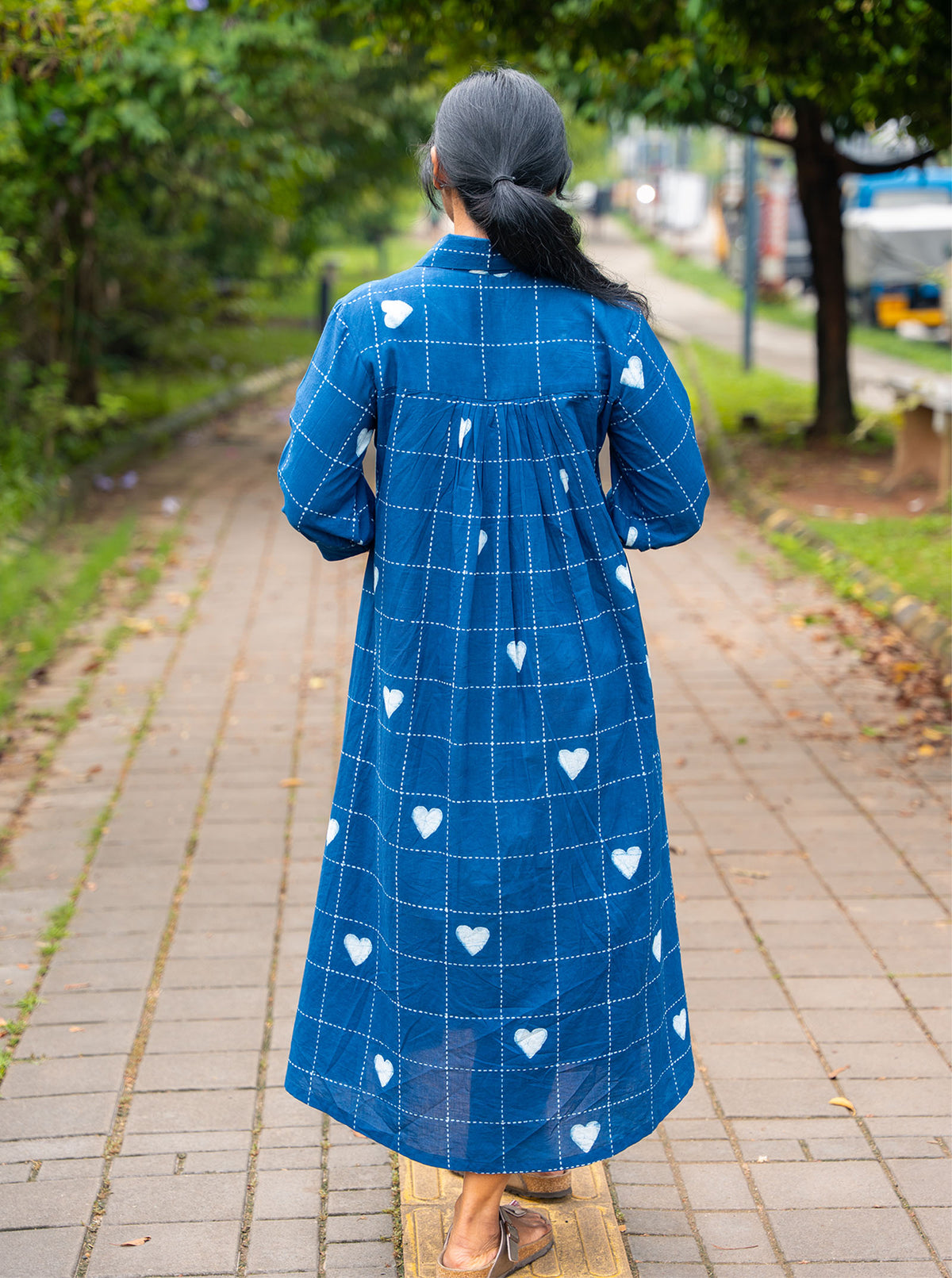 Indigo shirt dress with collar neck and gathered 3/4 sleeves, walking pose - Ariyaa
