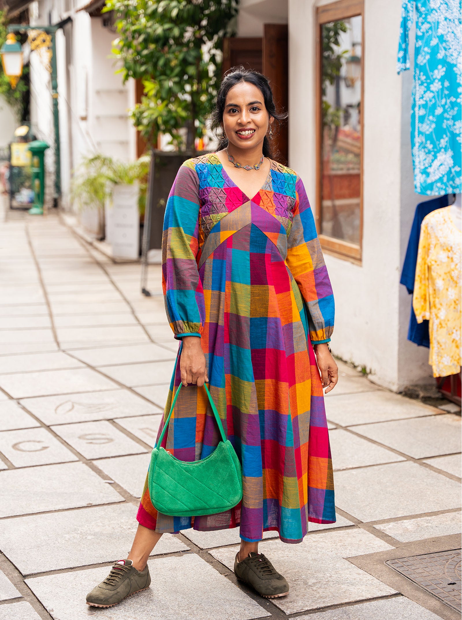 Model wearing multicolour checks handloom cotton front panel cut kurti full length - Ariyaa