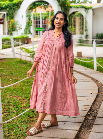 Model wearing pastel pink embroidered kurti full length — Ariyaa