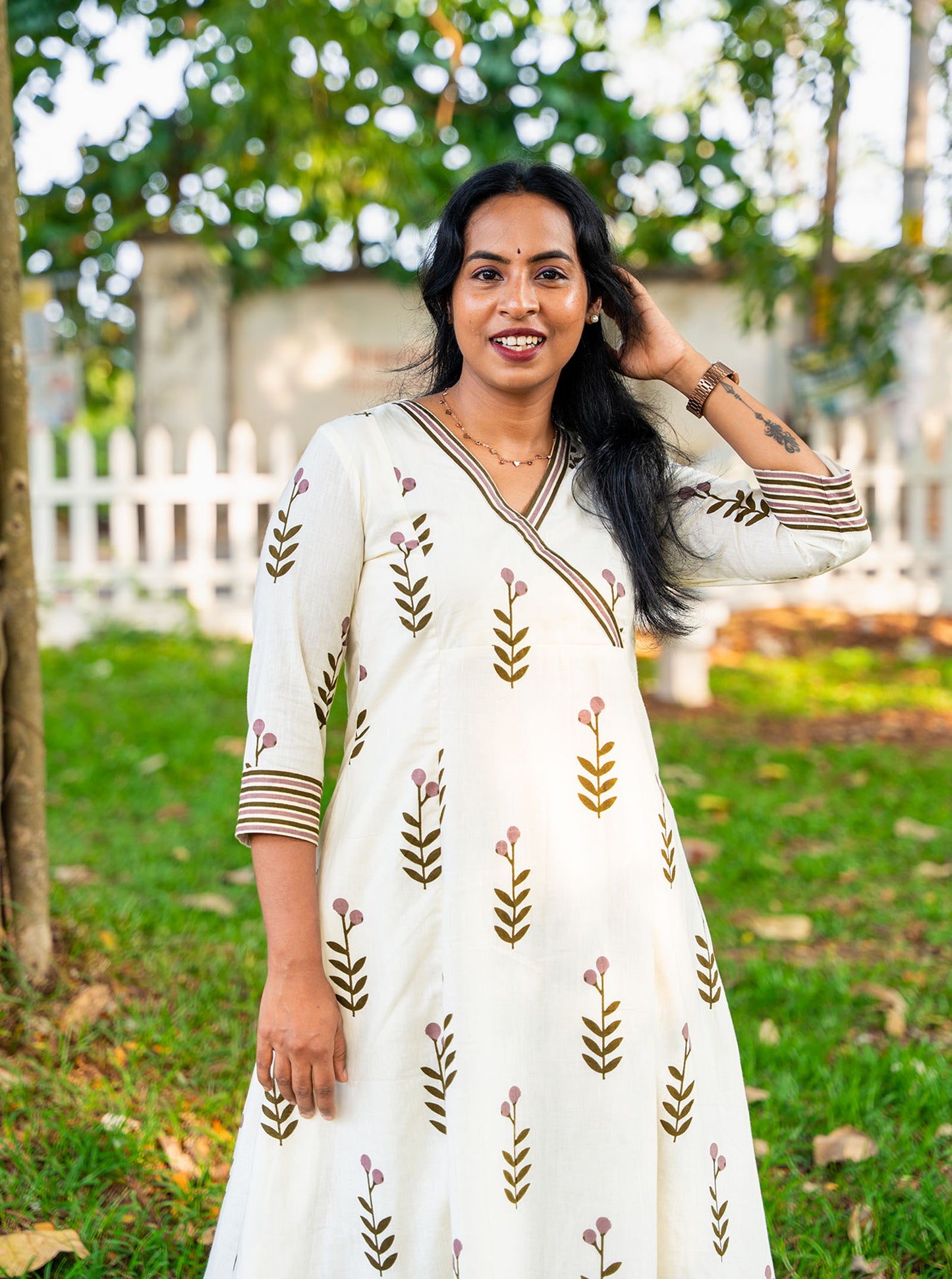 Close-up of flower motif pattern on cotton fabric — Ariyaa