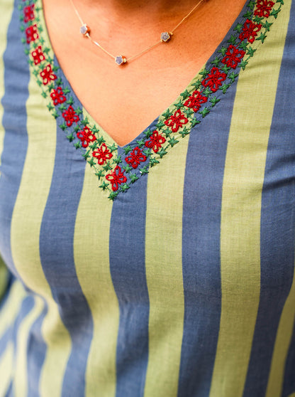Red and green floral embroidery tracing the V neck of a striped cotton dress - Ariyaa
