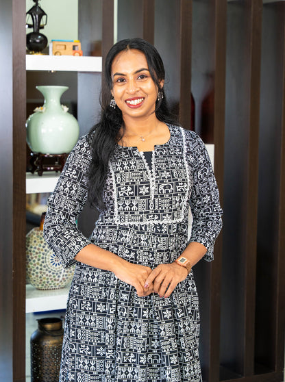 Black and white folk print cotton kurti styled for office and daily wear - Ariyaa