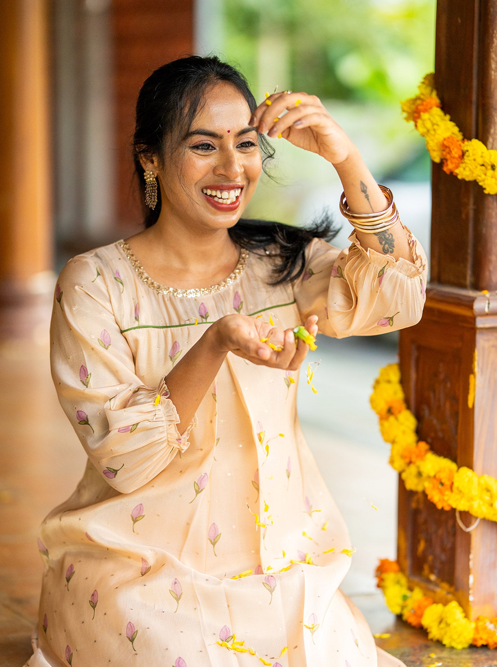 Flat lay of Mythili soft peach silk butta A-line kurti with lace neck detailing - Ariyaa