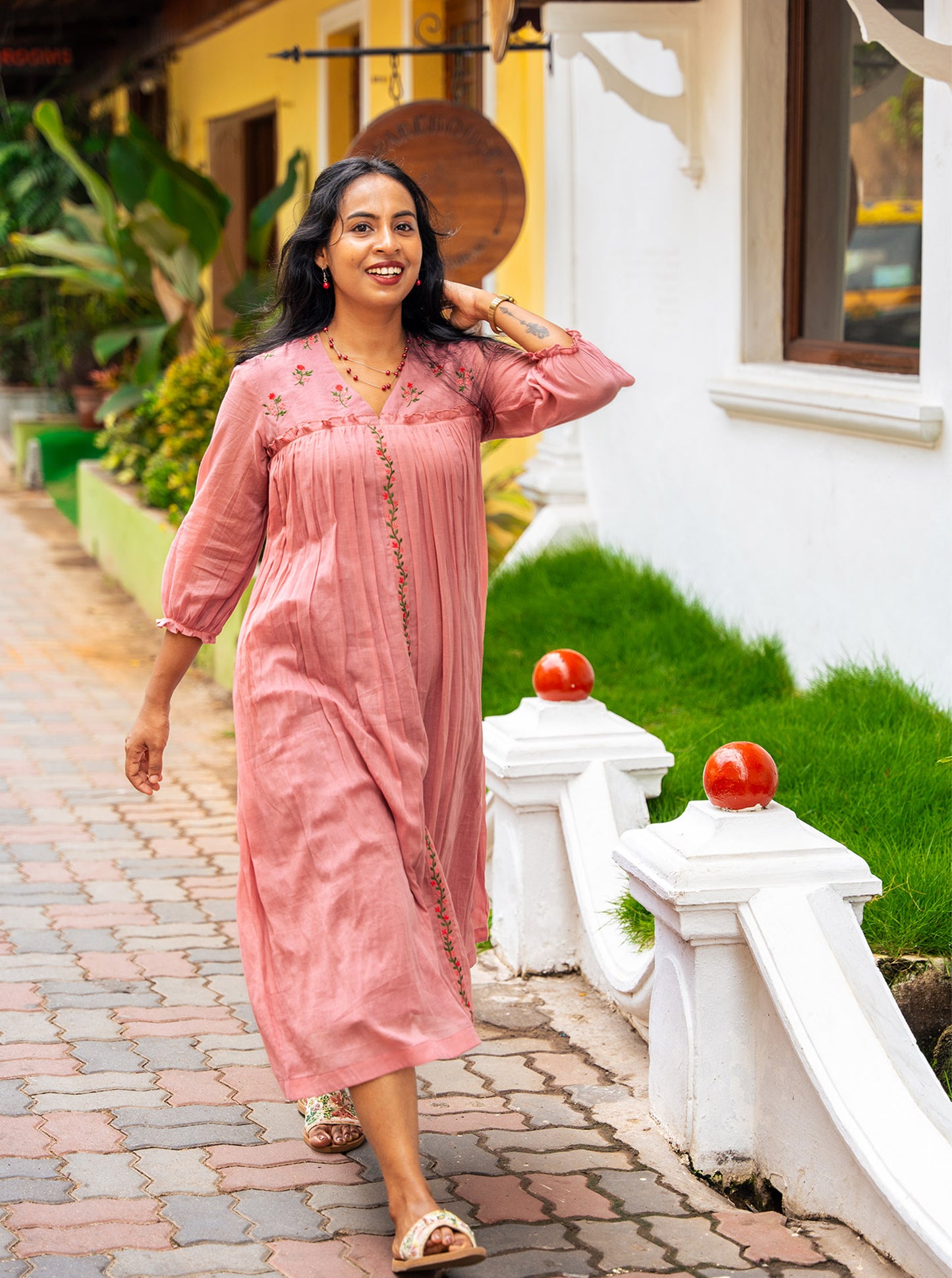 Model wearing pastel pink embroidered kurti full length — Ariyaa