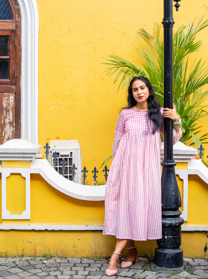 Pink and white handloom cotton A-line pleated kurti front view with checked yoke - Ariyaa