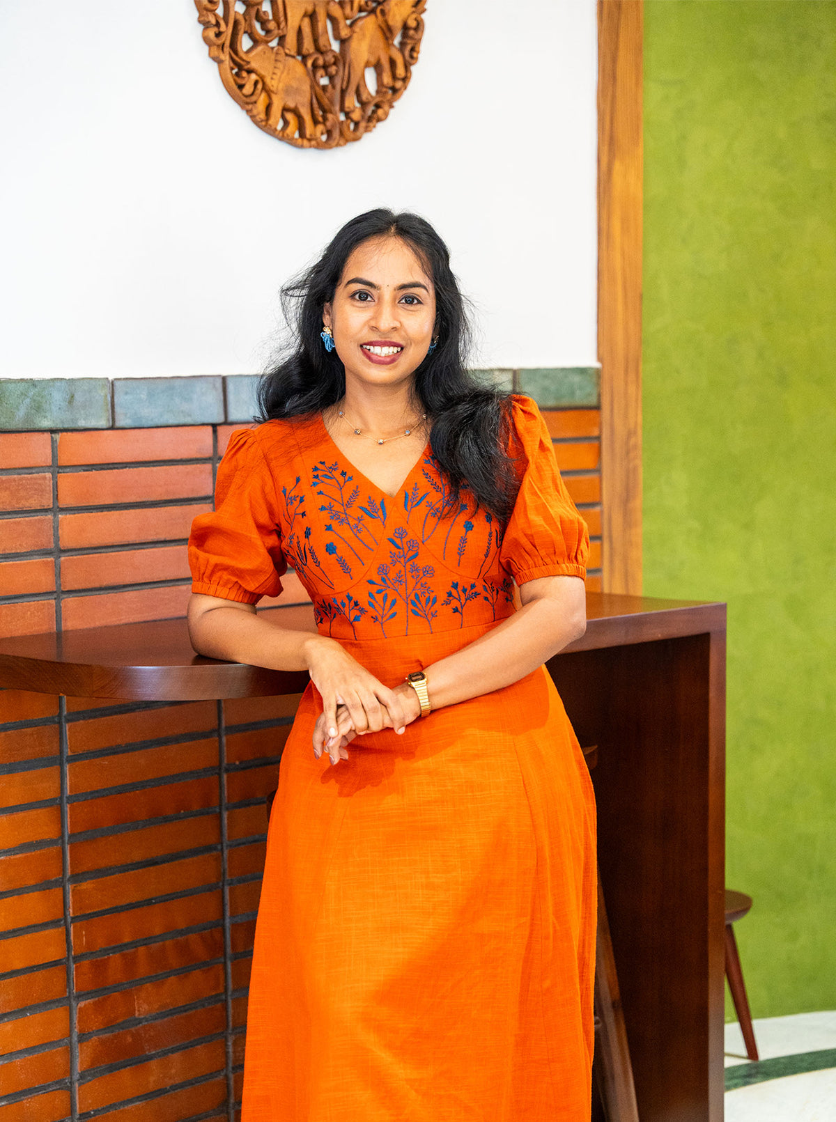Orange cotton dress with V neckline and elasticated puff sleeve cuffs - Ariyaa